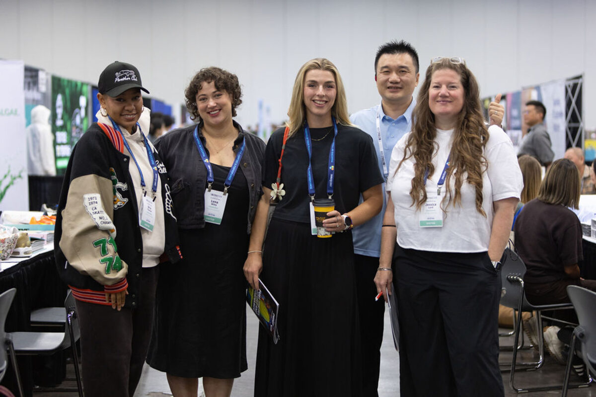 A smiling group of attendees at The Materials Show in Portland.
